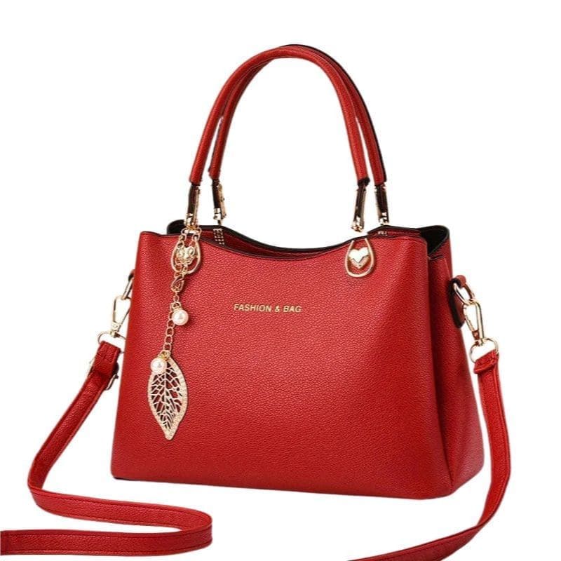 bolsa feminina tote grande maya com pingente vermelha
