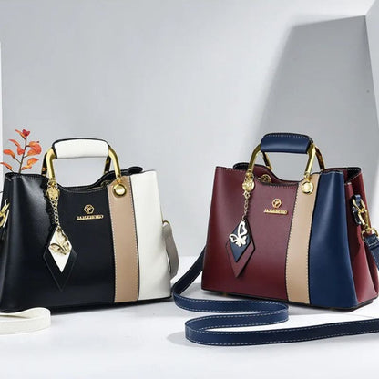 bolsa feminina com pingente