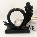 escultura abstrata resina preta